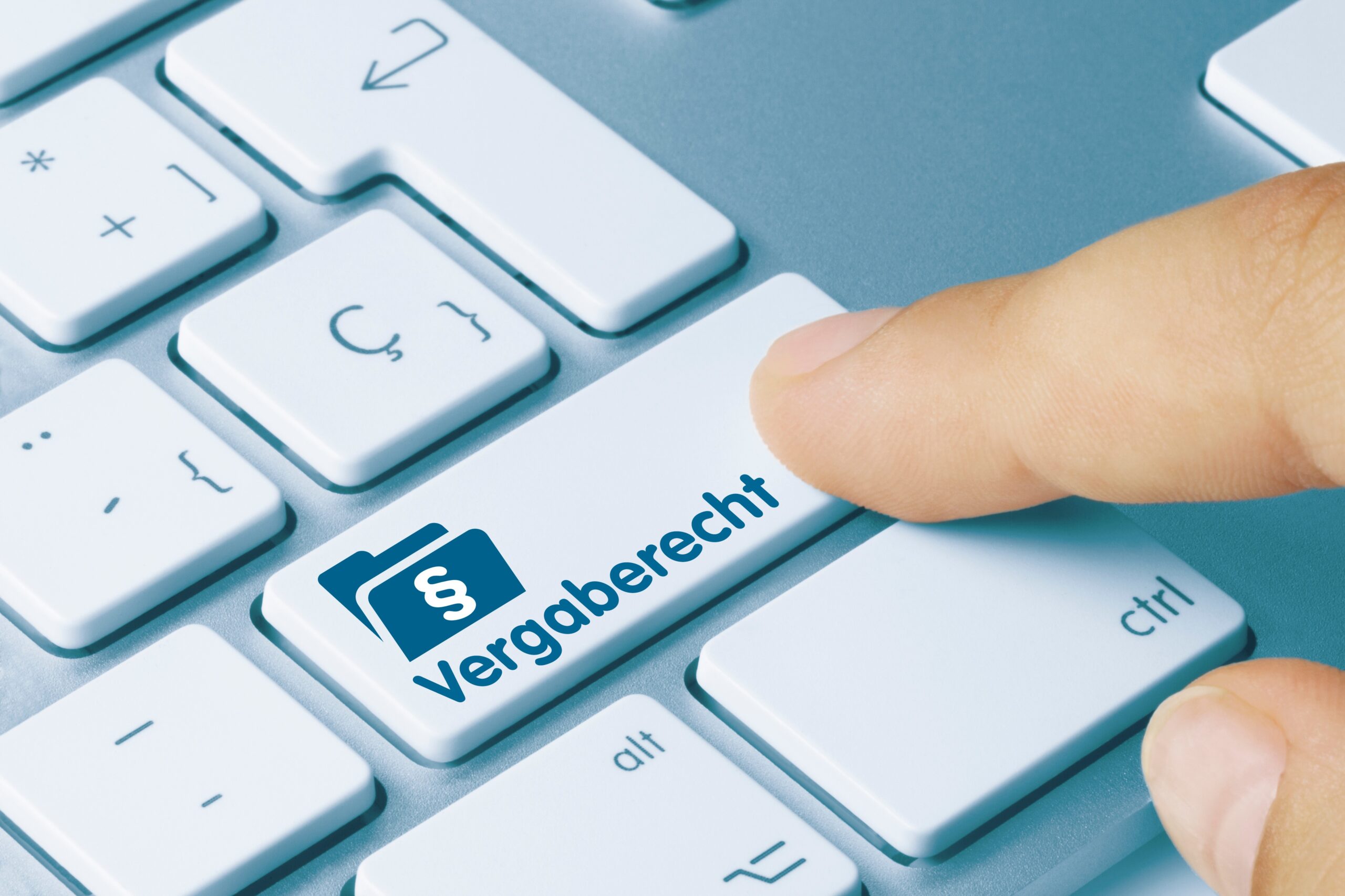 Vergaberecht - Wort auf blauen taste. Dekoratives Bild: Abstrakte Darstellung unseres Beschaffungszyklkuselements.
